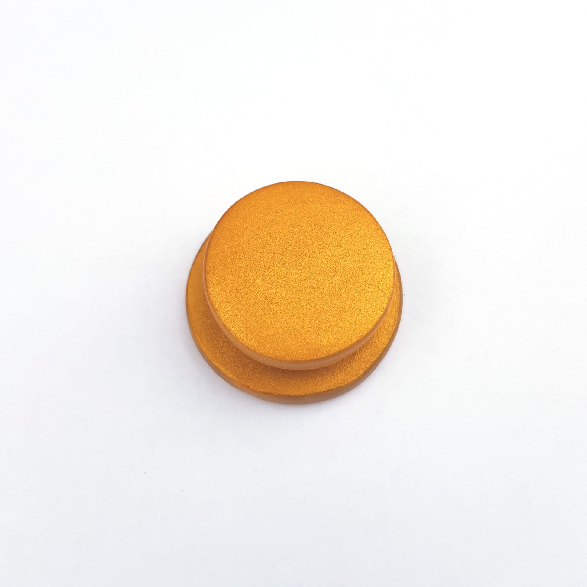 Back view of needle minder showing the plain, smooth disk