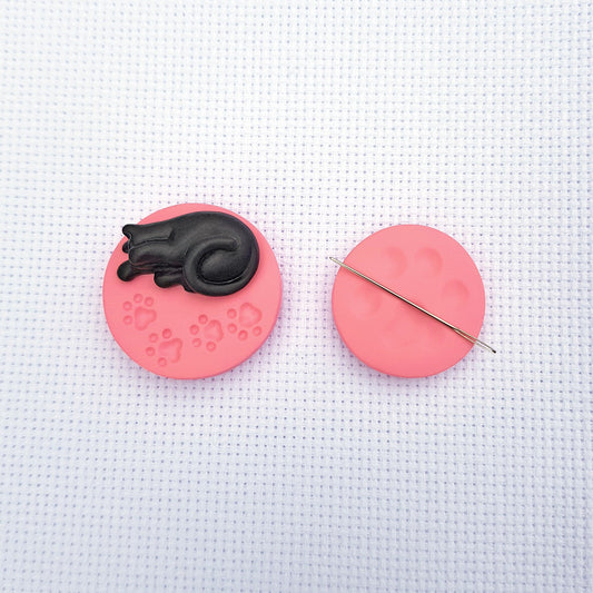 Black cat needle minder and pink paw print needle minder set