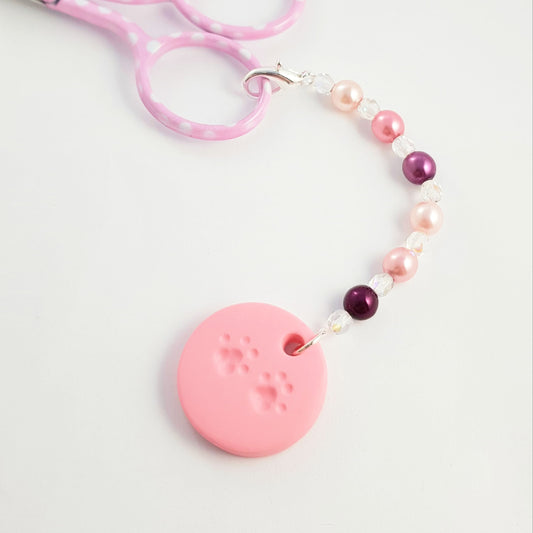 Pink cat paw print beaded scissor fob